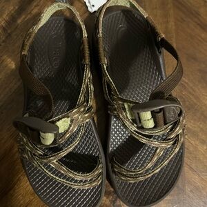 Chacos brown and green! Used with a lot of life left in them.